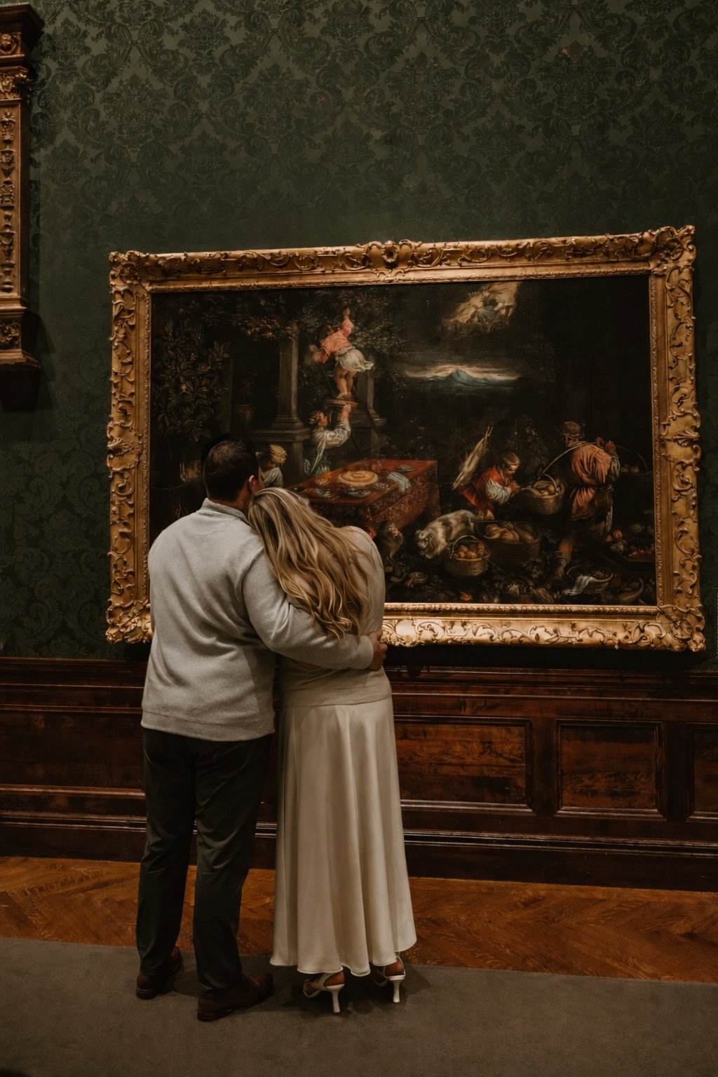 Karley and Michael admiring a painting together